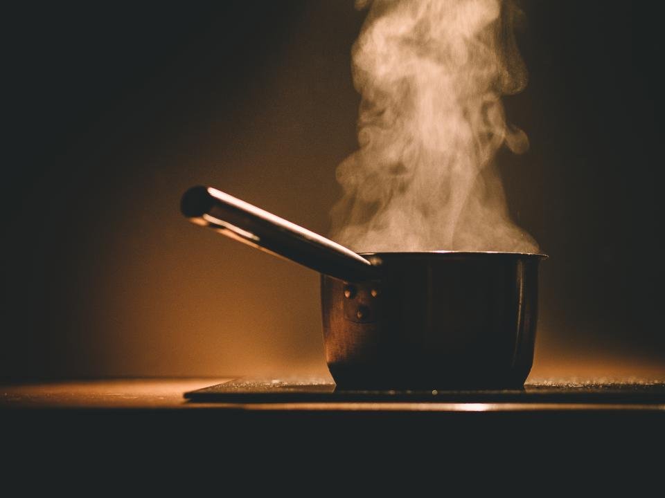 Pot cooking on a stove